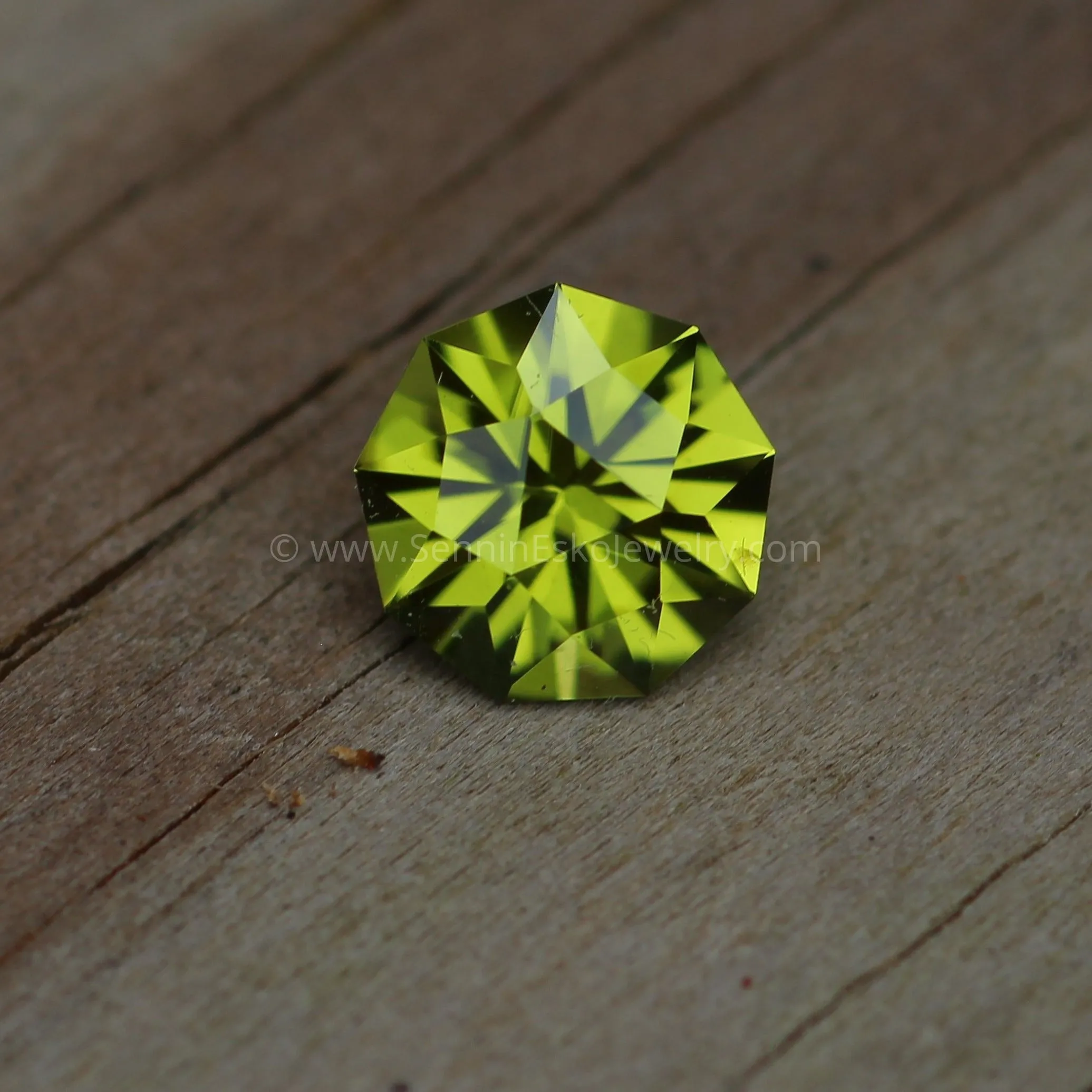 1.4 Carat Peridot Nanogon, 7.1mm in diameter - Precision Cut