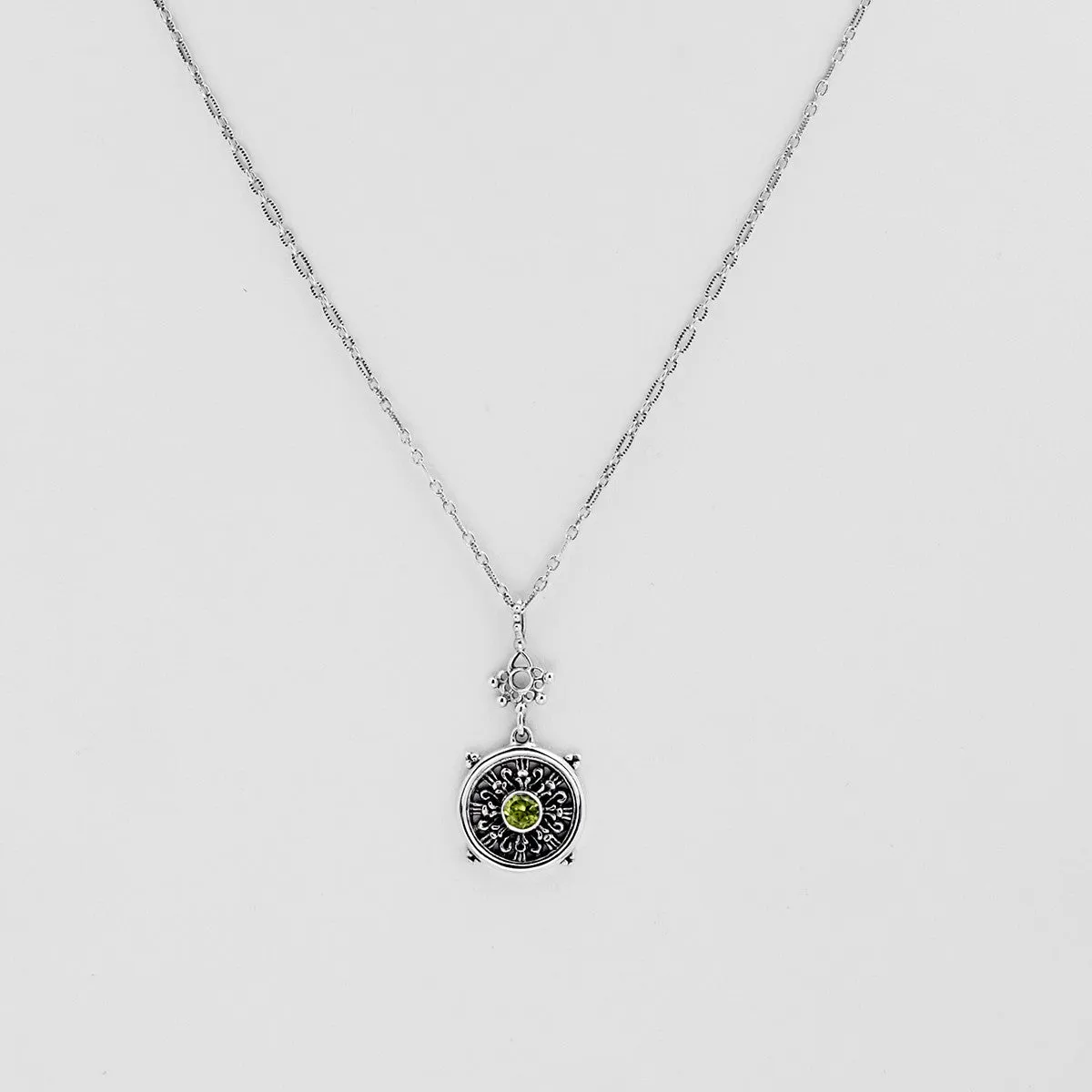 Dharmachakra Sterling Silver Peridot Grace Necklace