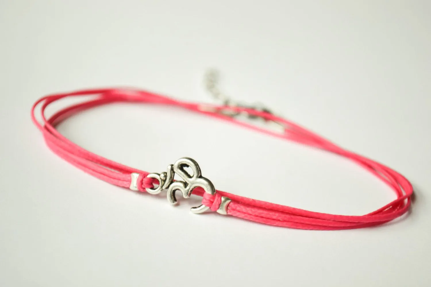 Om wrapped anklet, pink cord, silver charm, yoga ankle bracelet