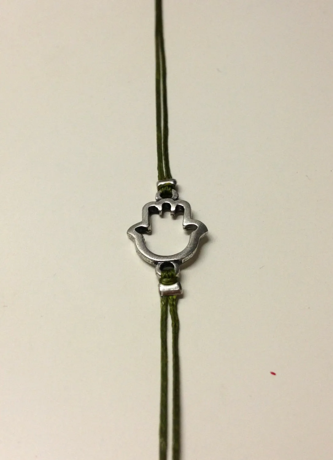 Silver Hamsa anklet, green cord